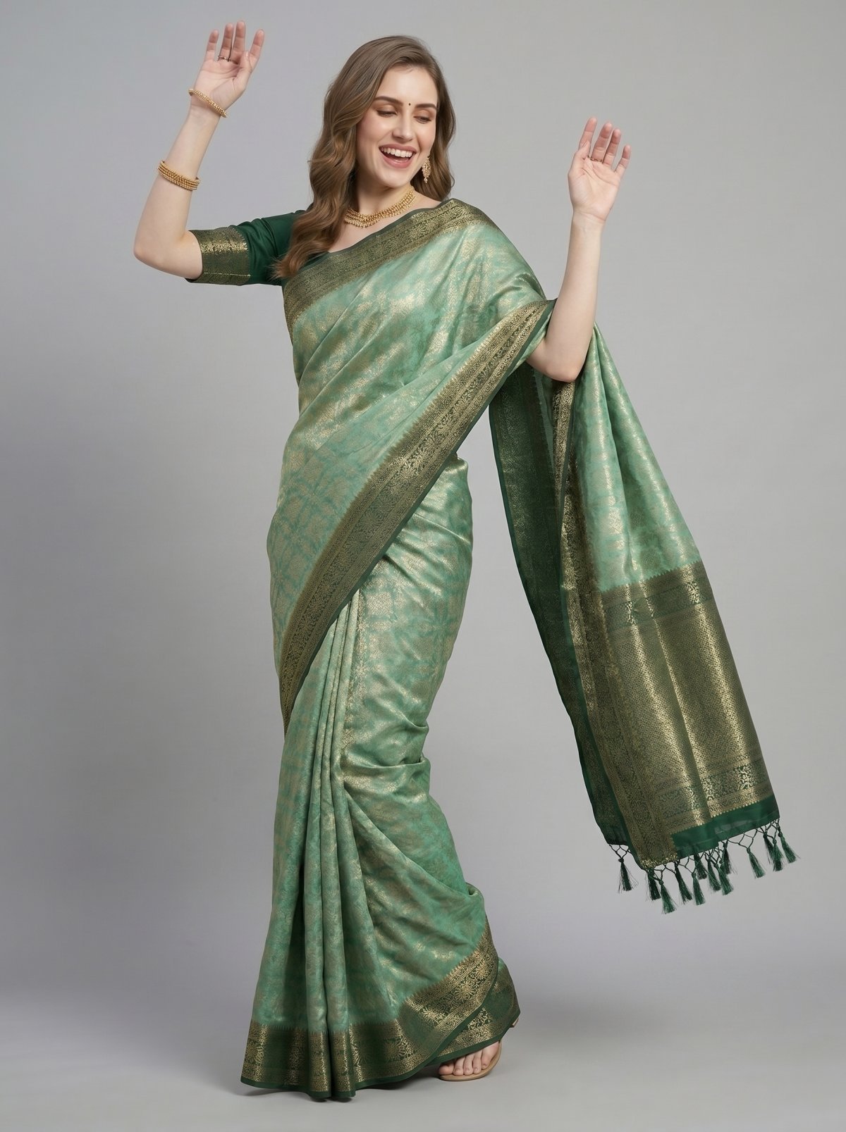 Pista Green Kanjivaram Tissue Saree with Dark Green Zari Brocade Border